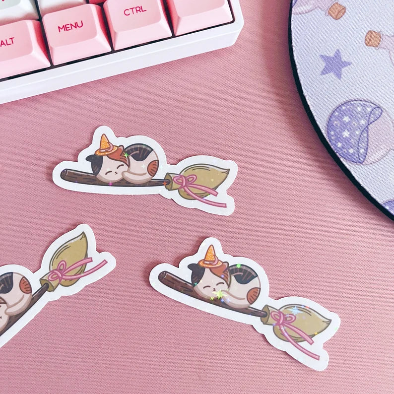 Holographic Stars Witchy Cat on Broomstick Vinyl Sticker