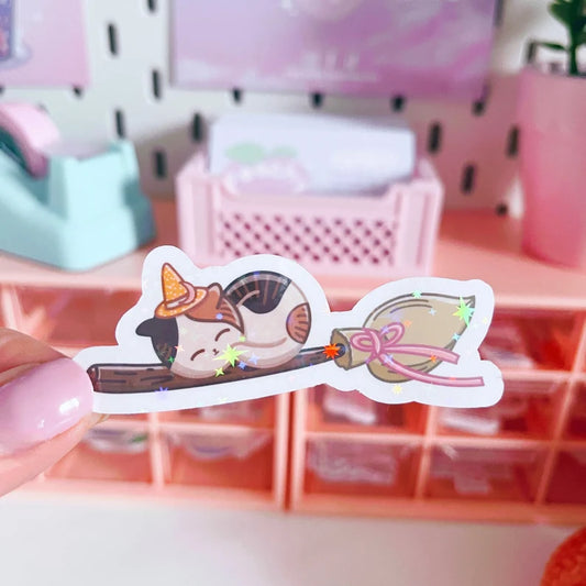 Holographic Stars Witchy Cat on Broomstick Vinyl Sticker
