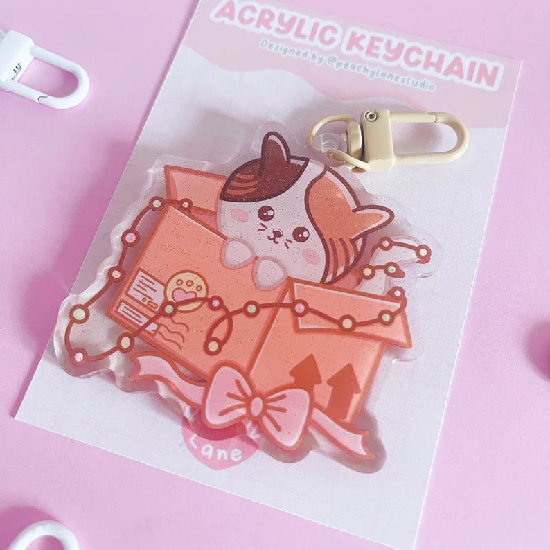 Cat In Box Glitter Acrylic Keychain