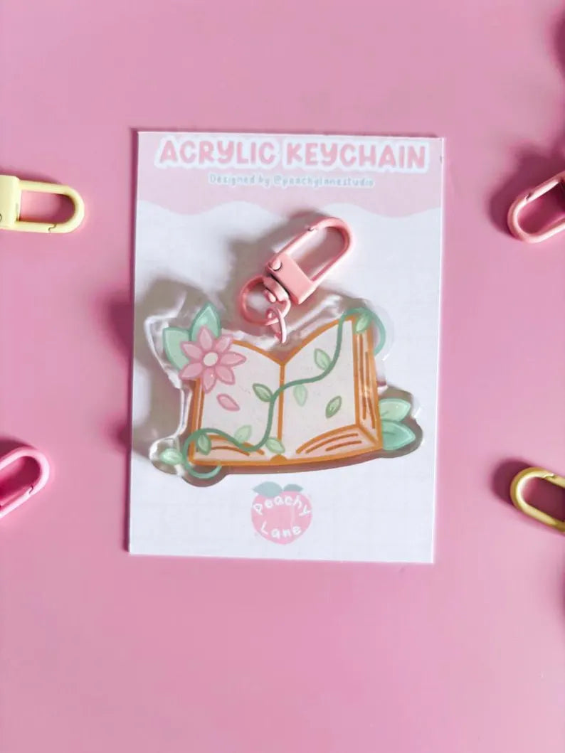 Floral Open Book Glitter Acrylic Keychain
